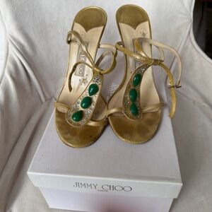JIMMY CHOO Metallic Gold Strappy Stiletto Sandals with Green accents. Size 8.5